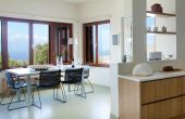 Flows through to dining area with window views. Table seats up to 10.