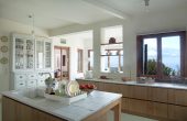 Spacious open planned kitchen with a central island and casual breakfast bar.